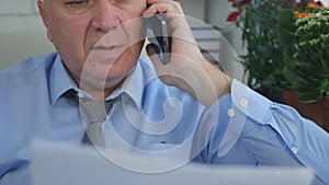 Manager Talking Business to Smartphone