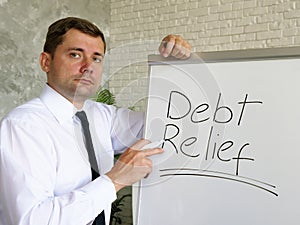The manager talks about debt relief in a bank.