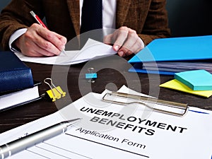 Manager and Unemployment benefits form photo