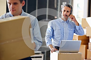 Manager Using Headset In Distribution Warehouse