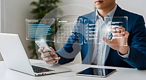Manager using mobile phone for project management and task completion