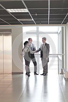 Manager welcomes the client in the lobby office