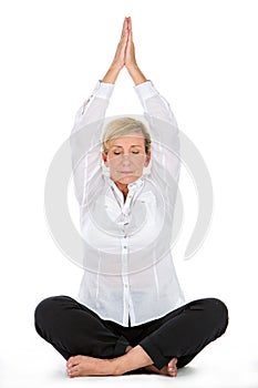 Manager woman doing yoga at white background