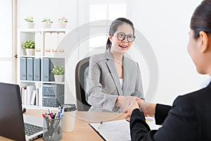 Manager woman handshake with young business sales