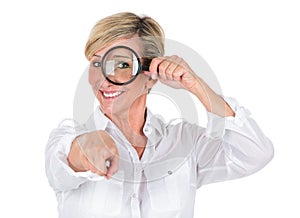 Manager woman looking through magnifying glass