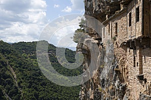 Kipinas manastery building high in cave and rocks photo