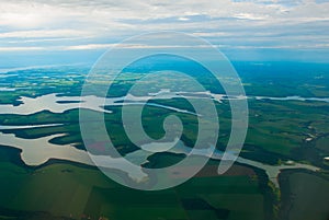 Manaus, Amazonas, Brazil: Top view of the river. Beautiful landscape from the window of the airplane