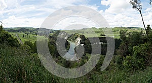 Manawatu river flowing through a wooded landscape in New Zealand