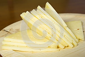 Manchego cheese cut into slices