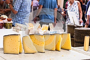 Manchego cheese for sale in the stall of Sineu market, Majorca