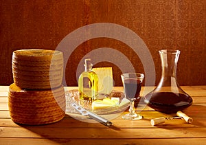 Manchego cheese from Spain in wooden table photo