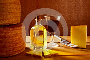 Manchego cheese from Spain in wooden table photo