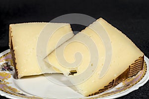 Manchego Curado cheese photo