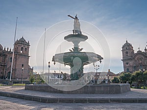 Manco Capac water fountain golden statue in Cusco photo