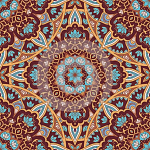 Mandala in blue and brown colors seamless pattern