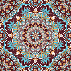 Mandala in blue and brown colors seamless pattern