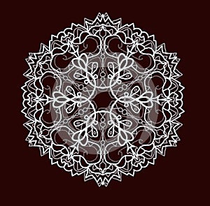 Mandala made of white patterns on a maroon background