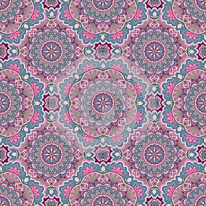 Mandala seamless pattern in blue and pink colors