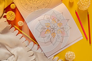 Mandalas antistress page to combat stress. Relaxing hobby mental wellbeing and art therapy. Meditative process of