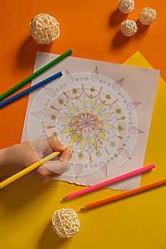 Mandalas antistress page to combat stress. Relaxing hobby mental wellbeing and art therapy. Meditative process of