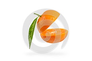 Mandarin cut in half with a green leaf. Fresh tangerine on a white isolated background. Open mouth concept. Tangerine