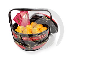 Mandarin oranges in basket with red envelope Good Luck character