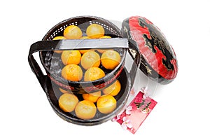 Mandarin oranges in basket with red envelope Good Luck character