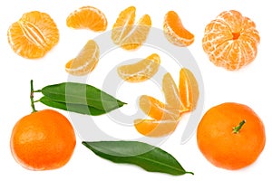 mandarin with slices and green leaf isolated on white background top view