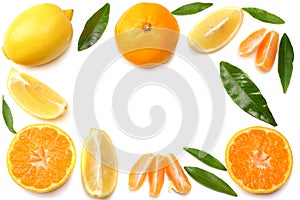 mandarin with slices, lemon and green leaf isolated on white background top view