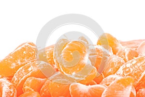 Mandarine slice (heap) on white background