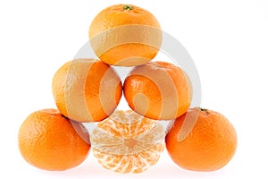 Mandarines, pyramid on white background