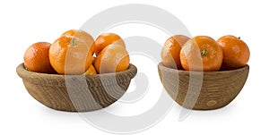 Mandarins in a wooden bowl with copy space for text. Ripe and tasty tangerines isolated on white. Clementines on a white backgroun