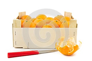 Mandarins in wooden crate