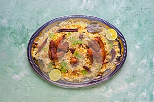 Mandi Kabsa, Yemenis style. Festive dish with baked chicken and rice