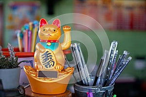 Maneki Neko, Japanese lucky cat, ingot mean symbols of good luck