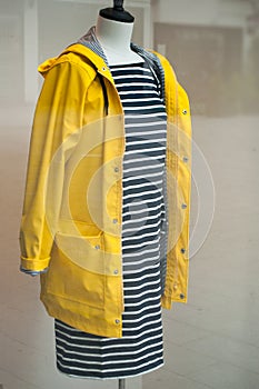 Manequin with yellow raincoat