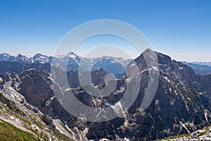 Mangart - Ascending via ferrata hiking trail to mount Mangart (Mangrt), border Italy Slovenia in Julian Alps