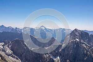 Mangart - Ascending via ferrata hiking trail to mount Mangart (Mangrt), border Italy Slovenia in Julian Alps