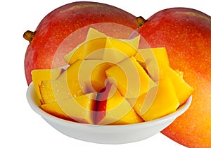 Mango galpso cubed on a white plate photo