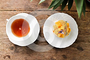 mango cake or mango cheese cake , mango cheese pie and hot tea
