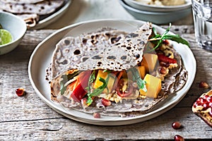 Mango Carrot Arugula and Hummus with Tortilla wrap