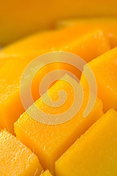 Mango cut and cubed in its skin. photo