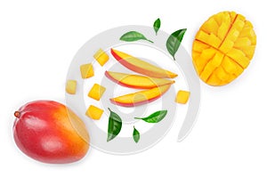 Mango fruit and half with slices isolated on white background. Top view. Flat lay