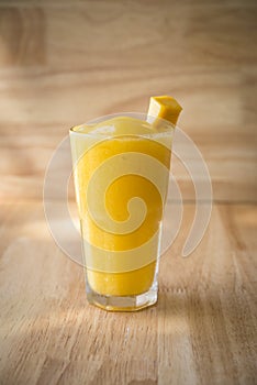 Mango Fruit shake with piece of mango for decor