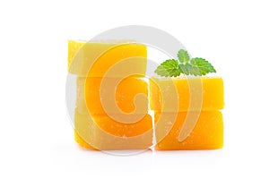 Mango jelly candies on white background