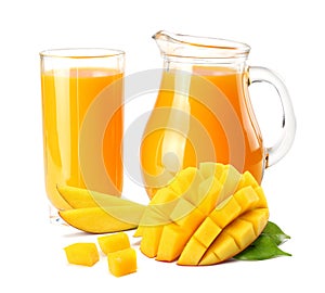 mango juice with mango slice isolated on white background. jug of mango juice.