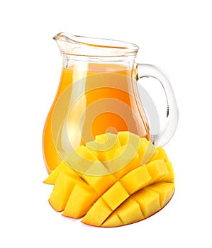 mango juice with mango slice isolated on white background. jug of mango juice.