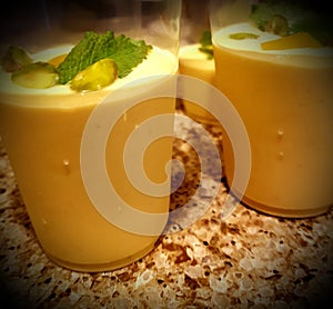 Mango milkshake with a top layer of cream