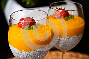 Mango mousse with chia seeds and coconut milk photo