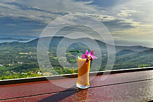 Mango and passion fruit smoothie on tropical samui island in thailand in mountains